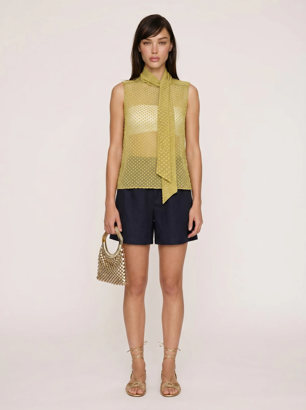 Generated full outfit with a sheer green top, shorts, sandals and the bag